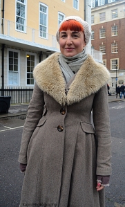 It is everything about her Coat . 